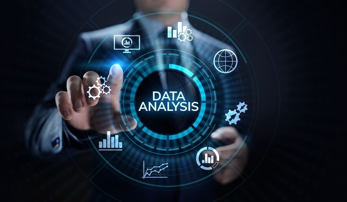 Data analyst reviewing a dashboard in Ghana